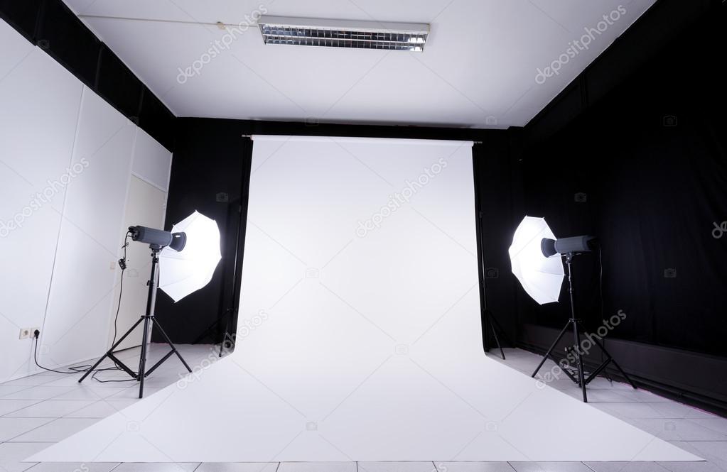 Modern photo studio with lighting equipment