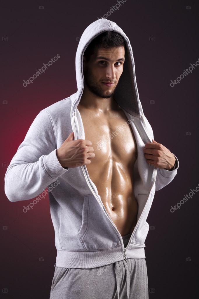 Handsome fitness man showing six pack abs on a dark background Stock Photo by ©cristovao 53414883 Handsome fitness man showing six pack abs on a dark background Stock Photo by ©cristovao 53414883