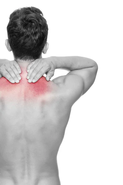 Young man holding his back in pain, isolated on white background — Stock Photo, Image