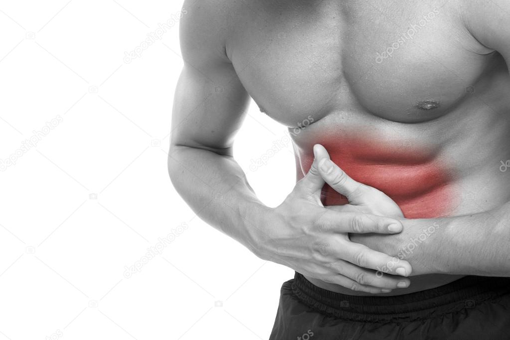 Young man holding his stomach in pain, isolated on white backgro