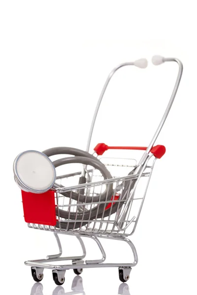 Shopping cart with a stethoscope — Stock Photo, Image