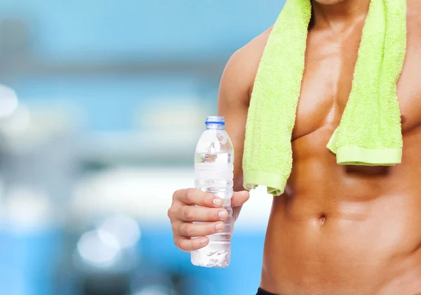 Man holding a bottle of water — Stock Photo, Image