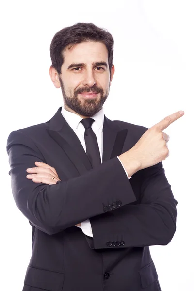 Hombre de negocios guapo señalando hacia arriba, aislado sobre fondo blanco — Foto de Stock