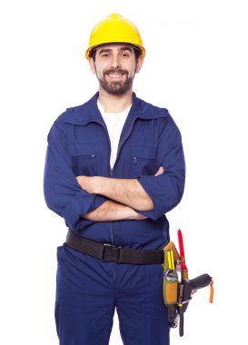 Yakışıklı bir gülümseyen yüklenici, üzerinde beyaz izole portresi 