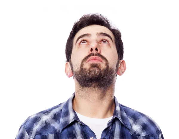 Pensive casual man looking up — Stock Photo, Image