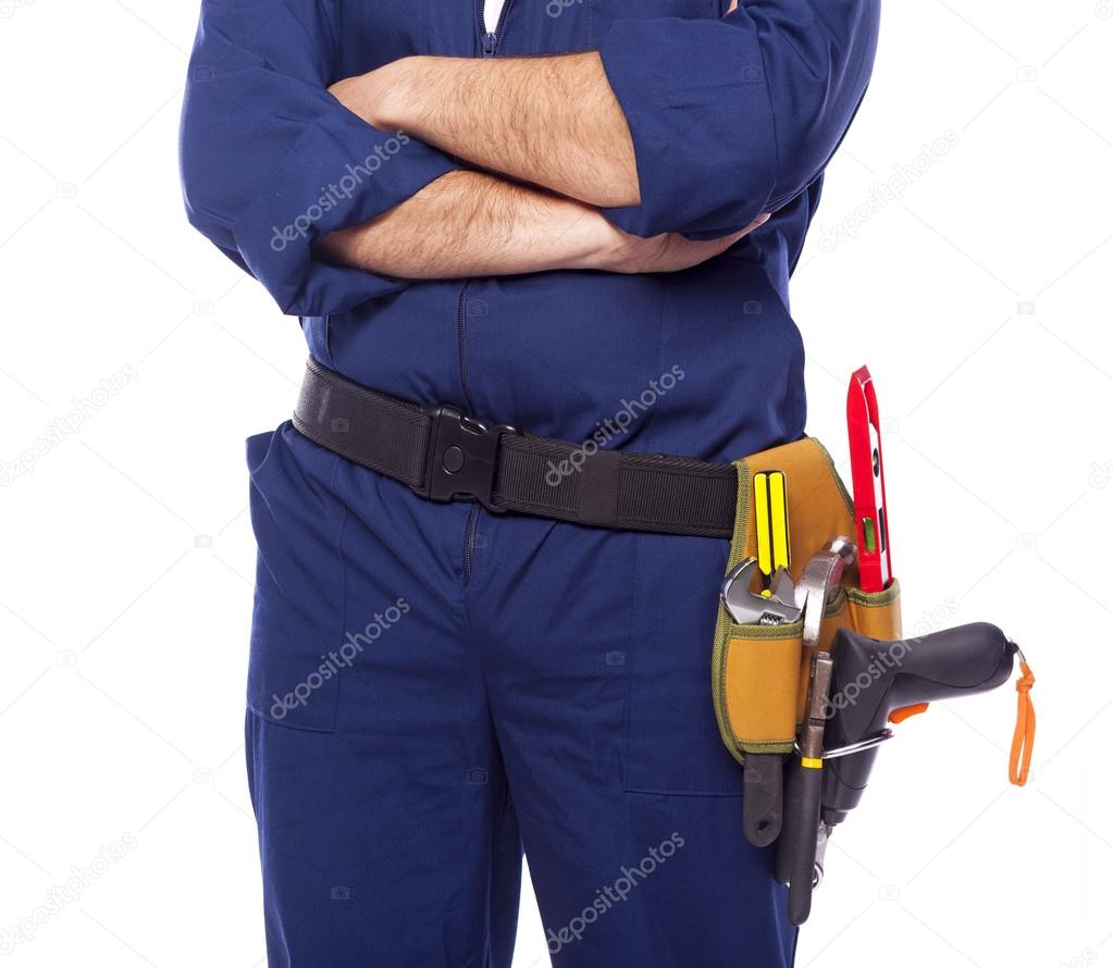 Contractor standing with toolbelt