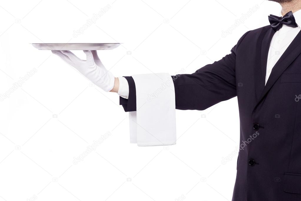 Waiter holding an empty silver tray