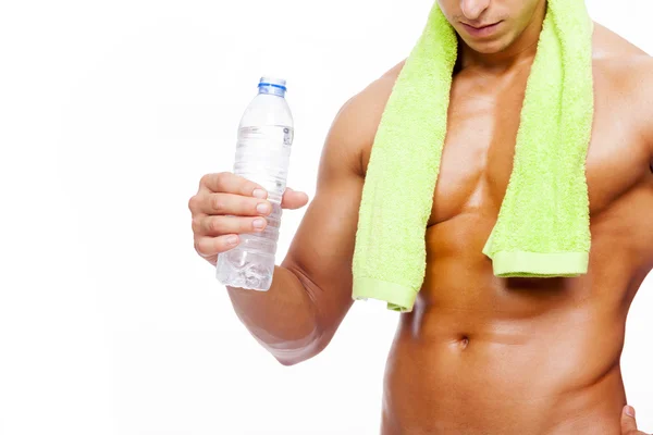 Fit man holding water bottle — Stock Photo, Image