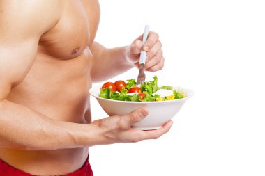 Salata bir kase tutarak adam uygun
