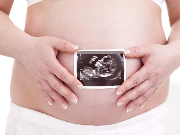 Femme enceinte tenant une échographie — Photo