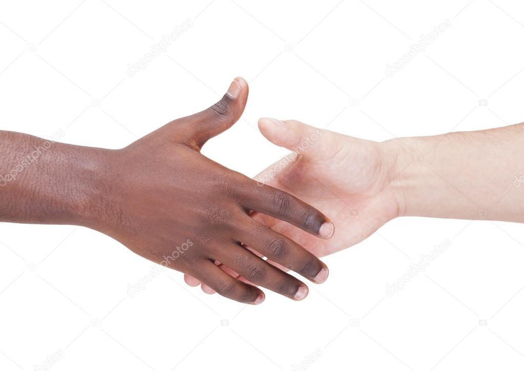 Handshake between caucasian and african man