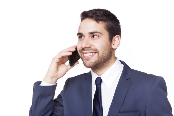 Homem de negócios sorrindo falando ao telefone — Fotografia de Stock