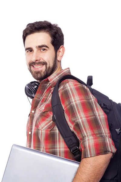 Leende student håller en laptop — Stockfoto