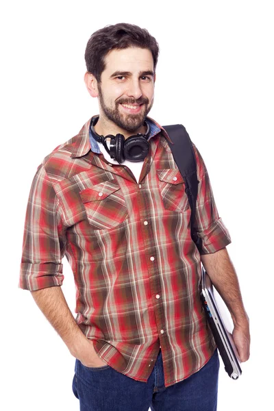 Handsome student holding a laptop — Stock Photo, Image