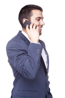 cep telefonuyla konuşurken iş adamı