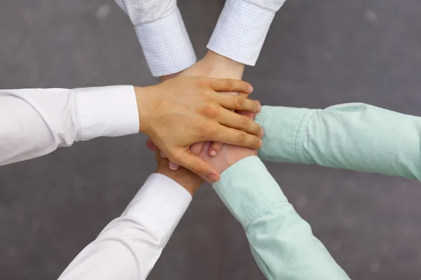 Top view of teamwork handshake — Stock Photo, Image