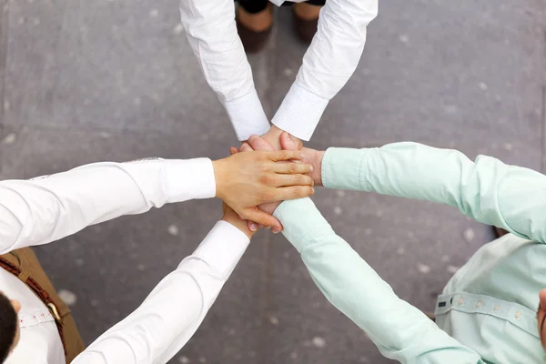 Top view of teamwork handshake — Stock Photo, Image