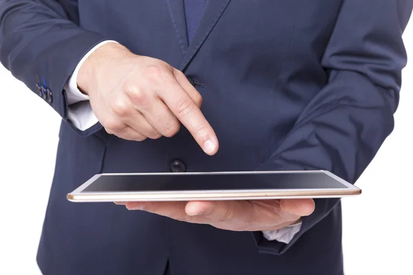 Homem de negócios segurando um computador tablet — Fotografia de Stock