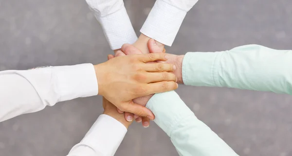 Top view of teamwork handshake — Stock Photo, Image