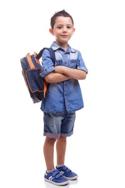 Niño de la escuela de pie con los brazos cruzados — Foto de Stock