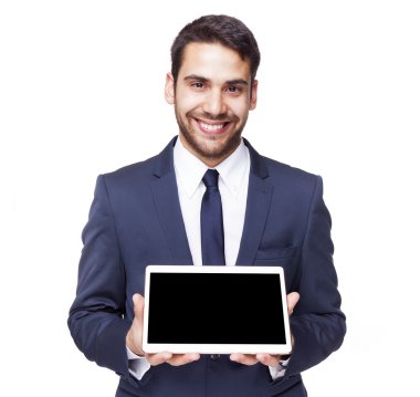 Bir tablet bilgisayar gösterilen iş adamı