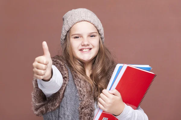 Femmina giovanissima studente pollice su — Foto Stock