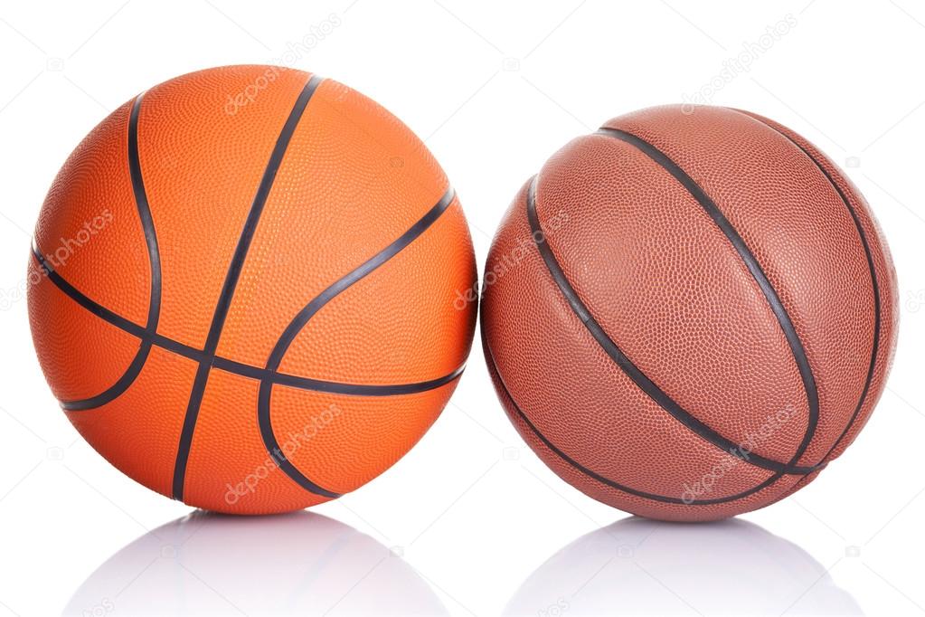 Two basketballs isolated on a white background