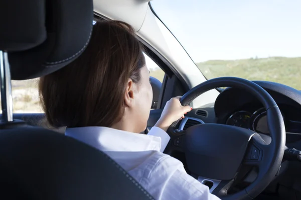 Businesswoman driving a sports car — Stock Photo, Image