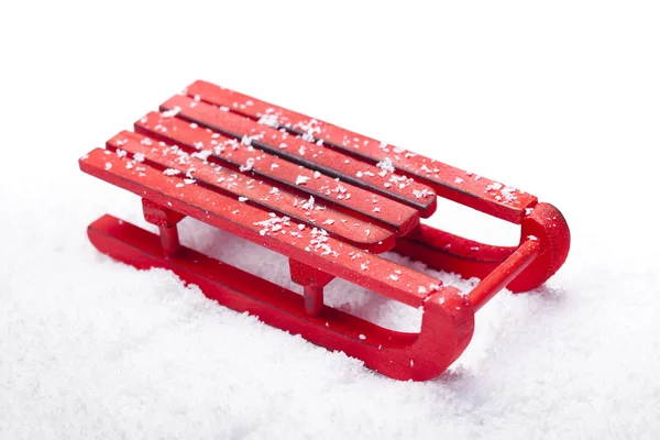 Sled vermelho com neve — Fotografia de Stock