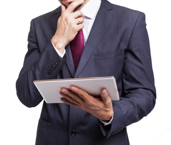 Biznesmen, trzymając jego cyfrowy tablicowy — Zdjęcie stockowe