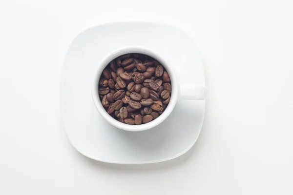 Tasse à café avec grains de café — Photo