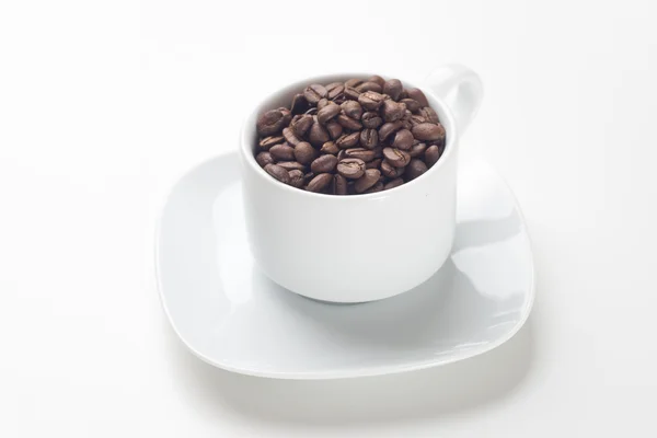 Tazza di caffè con chicchi di caffè — Foto Stock