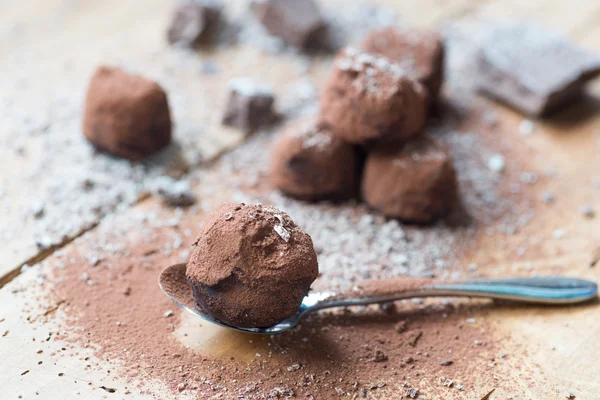 Dark chocolate truffles with cocoa powder — Stock Photo, Image