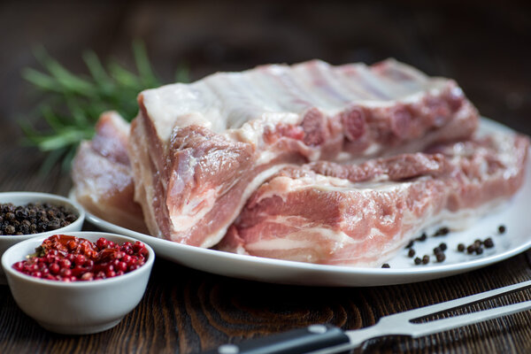 Close up Raw Pork Rib meat on white dish
