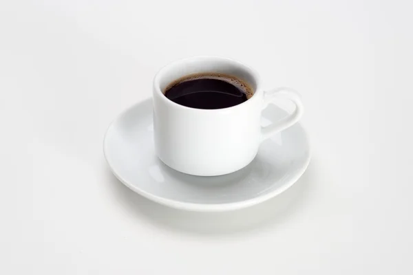 Cup of coffee over white background — Stock Photo, Image