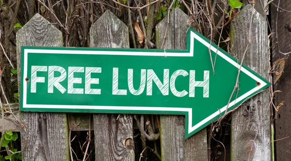 Green signboard with free lunch inscription
