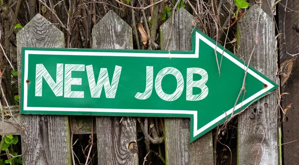 Green signboard with new job inscription — Stock Photo, Image