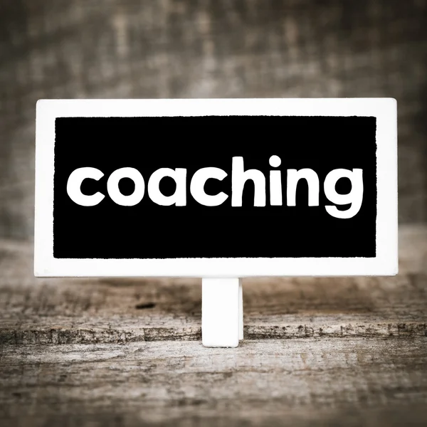 Coaching handwritten on blackboard — Stock Photo, Image