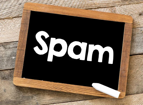 Palabra de spam en pizarra con tiza — Foto de Stock