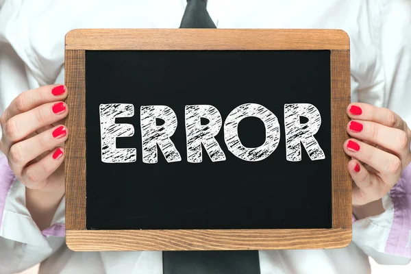 Manos con inscripción de error en pizarra — Foto de Stock