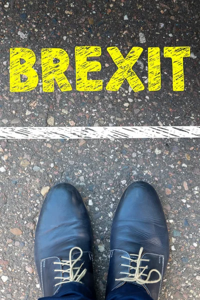 Muž nohy s aplikací word Brexit — Stock fotografie