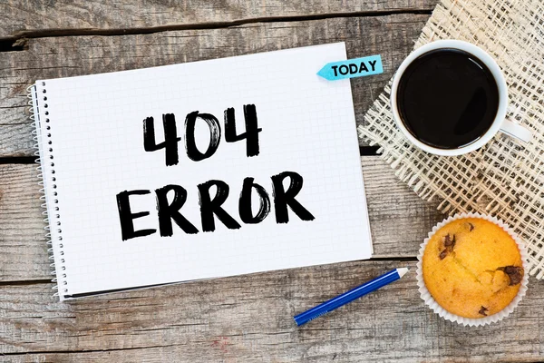 Caderno com um texto de erro 404 — Fotografia de Stock