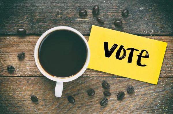 Mensaje voto y taza de café — Foto de Stock