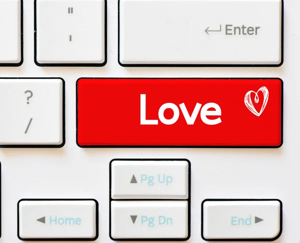 Love inscription on white keyboard — Stock Photo, Image