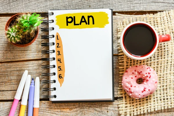 Notebook met plan — Stockfoto