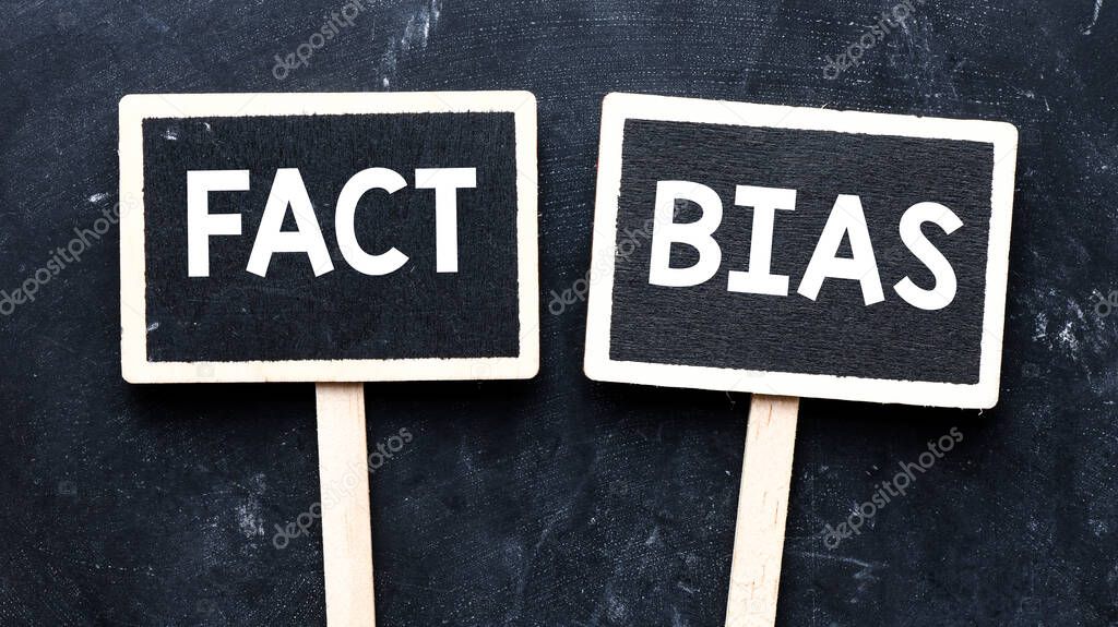 FACT BIAS text written on small chalk boards. 