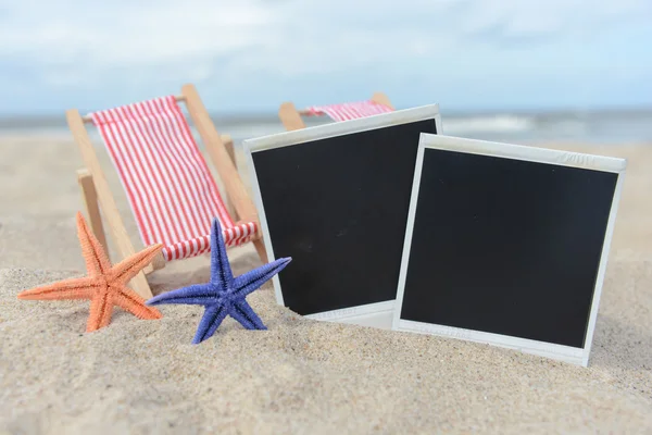 Starfishes and picture — Stock Photo, Image