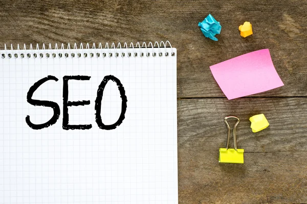 Seo written on note paper — Stock Photo, Image