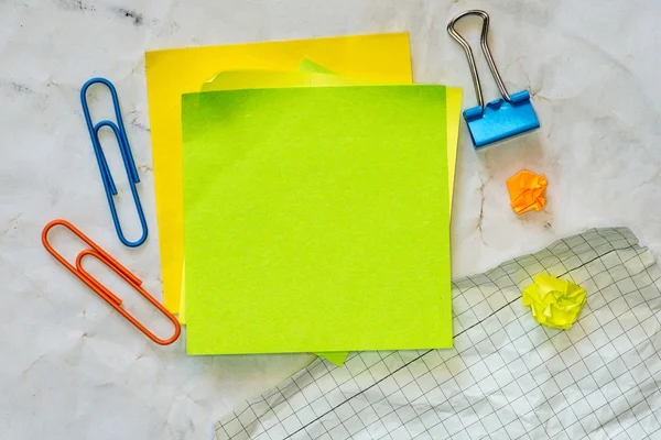 Sticky notes isolated on old paper background — Stock Photo, Image