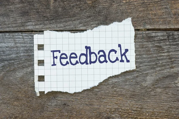 Feedback escrito no papel — Fotografia de Stock